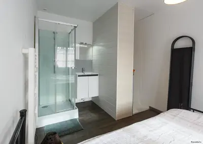 Salle de bains dans l'établissement LE REPAIRE - T2 23 m2