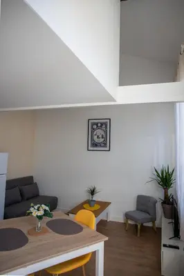 Coin salon dans l'établissement L'Amsterdam - Duplex trés calme au dernier étage
