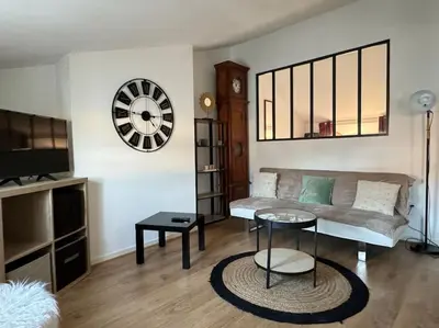 Coin salon dans l'établissement ღ Pertuis - Au cœur de Saintes, Spacieux & Cosy