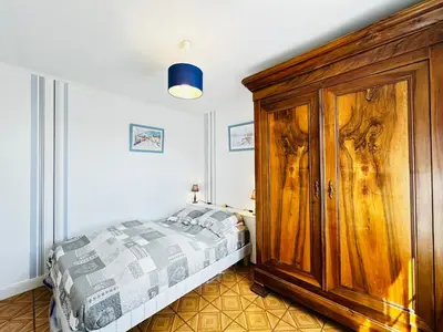 Un ou plusieurs lits dans un hébergement de l'établissement Charmante Maison de Vacances Fouras - Plage Nord - FR-1-709-80
