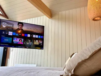 Télévision ou salle de divertissement dans l'établissement Home Paradis & Spa