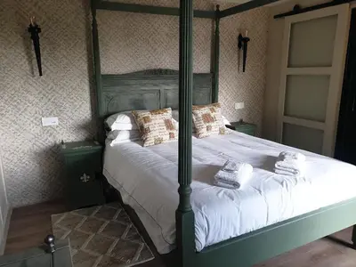 Un ou plusieurs lits dans un hébergement de l'établissement La Maison Ronde