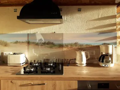 Cuisine ou kitchenette dans l'établissement Domaine de Fontcouverte - Gîte