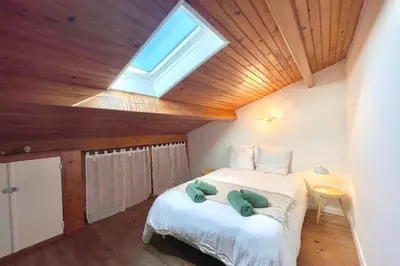 Un ou plusieurs lits dans un hébergement de l'établissement La Touzetterie avec SPA-cour privée