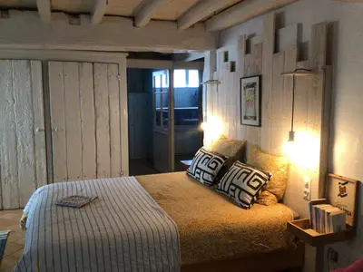 Un ou plusieurs lits dans un hébergement de l'établissement La grotte du pèlerin - Appartement semi-troglodyte