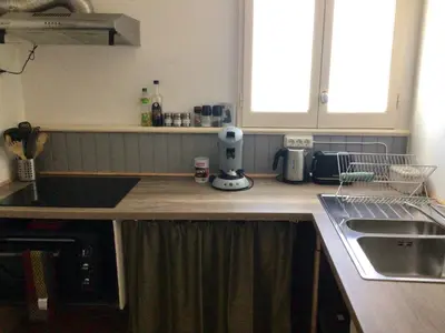 Cuisine ou kitchenette dans l'établissement La grotte du pèlerin - Appartement semi-troglodyte