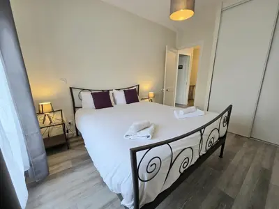 Un ou plusieurs lits dans un hébergement de l'établissement Bel appartement plein coeur d'Angoulême