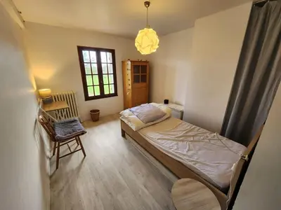 Un ou plusieurs lits dans un hébergement de l'établissement Spacious house with large garden in Valdivienne