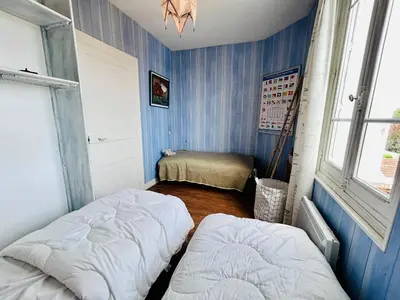 Un ou plusieurs lits dans un hébergement de l'établissement Villa Océan- Vue imprenable sur la côte Atlantique