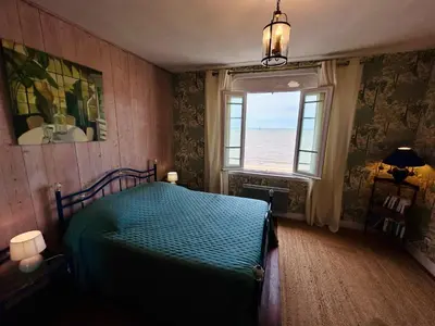 Un ou plusieurs lits dans un hébergement de l'établissement Villa Océan- Vue imprenable sur la côte Atlantique
