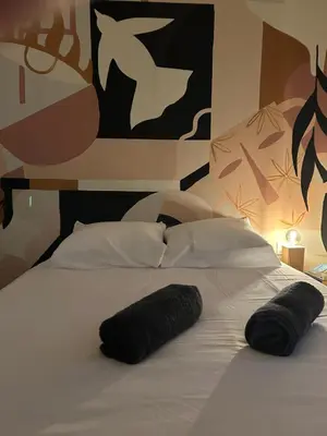 Un ou plusieurs lits dans un hébergement de l'établissement Bel Appartement Duck, Centre, Sèvres