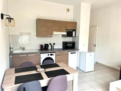 Cuisine ou kitchenette dans l'établissement Appartement calme avec exterieur