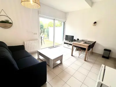 Coin salon dans l'établissement Appartement calme avec exterieur
