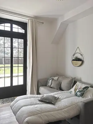 Un ou plusieurs lits dans un hébergement de l'établissement Logis Hôtel Domaine du Vieux Porche