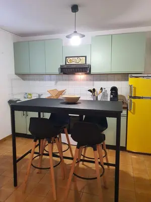 Cuisine ou kitchenette dans l'établissement Studio Le Petit Baigneur