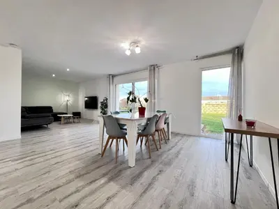 Coin salon dans l'établissement MAISON DE OSIER-JUSQU'A 6 PERSONNES-WIFi
