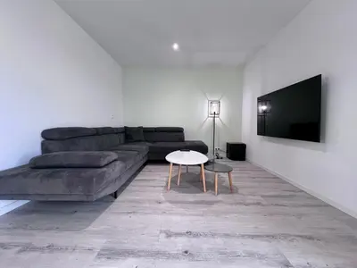 Coin salon dans l'établissement MAISON DE OSIER-JUSQU'A 6 PERSONNES-WIFi