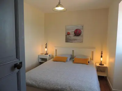 Un ou plusieurs lits dans un hébergement de l'établissement Jolie maison 3 étoiles entièrement rénovée