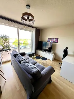 Télévision ou salle de divertissement dans l'établissement Le Corsaire - Appartement spacieux avec terrasse