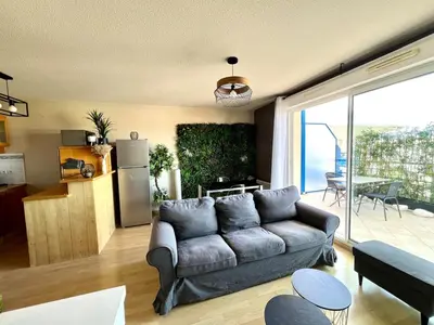 Coin salon dans l'établissement Le Corsaire - Appartement spacieux avec terrasse