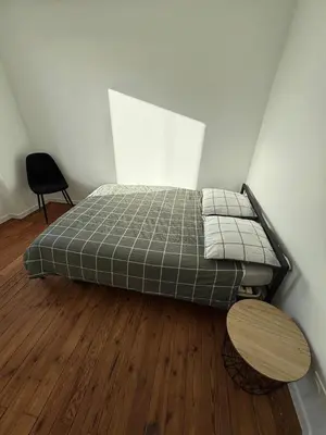 Un ou plusieurs lits dans un hébergement de l'établissement Maison proche ville - Chez Marsou