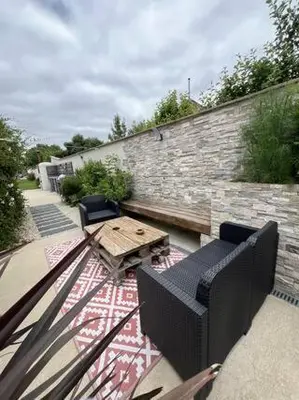 Coin salon dans l'établissement Villa L'Oasis