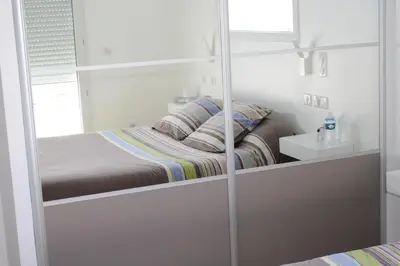 Un ou plusieurs lits dans un hébergement de l'établissement Villa L'Oasis