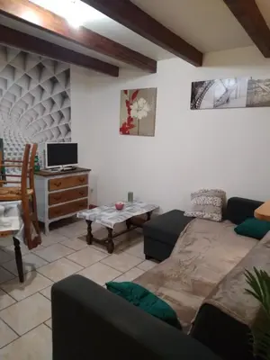 Coin salon dans l'établissement Gîte à la campagne en pays mellois