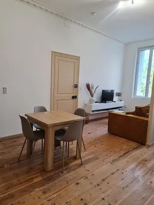 Coin salon dans l'établissement Chanzy Immo