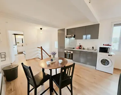 Cuisine ou kitchenette dans l'établissement Appartement paisible proche centre