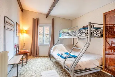 Un ou plusieurs lits dans un hébergement de l'établissement Chambre Songes d'Afrique
