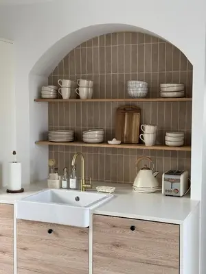 Cuisine ou kitchenette dans l'établissement Jolie Villa avec bain balnéothérapie