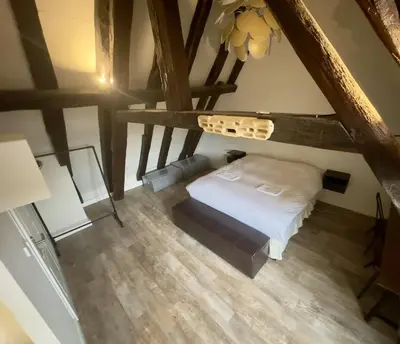 Un ou plusieurs lits dans un hébergement de l'établissement Les Arches