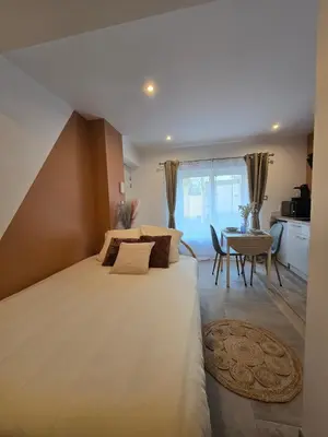 Un ou plusieurs lits dans un hébergement de l'établissement S2 SWEET HOMES I Studio proche centre I Parking inclu