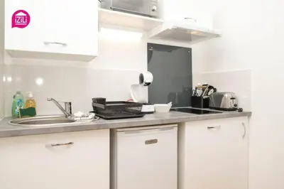 Cuisine ou kitchenette dans l'établissement Huka Studio - Centre Ville Poitiers