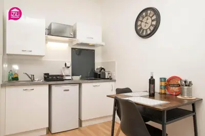 Cuisine ou kitchenette dans l'établissement Huka Studio - Centre Ville Poitiers