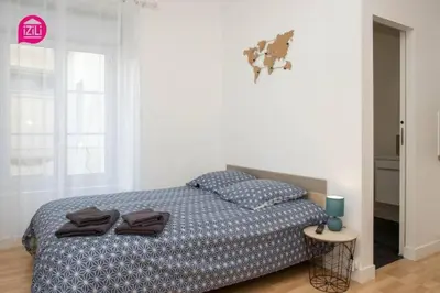 Un ou plusieurs lits dans un hébergement de l'établissement Huka Studio - Centre Ville Poitiers