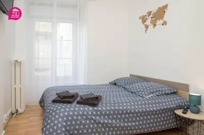Un ou plusieurs lits dans un hébergement de l'établissement Huka Studio - Centre Ville Poitiers