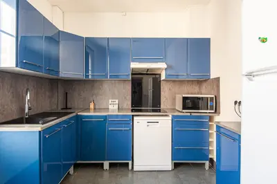 Cuisine ou kitchenette dans l'établissement Appartement Ancien - 4 chambres - Centre ville Poitiers