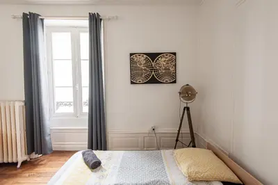 Un ou plusieurs lits dans un hébergement de l'établissement Karijini Apartment 1 bedroom - City Center - Poitiers