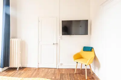 Télévision ou salle de divertissement dans l'établissement Uluru - Centre Ville - Poitiers