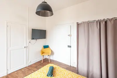 Télévision ou salle de divertissement dans l'établissement Uluru - Centre Ville - Poitiers
