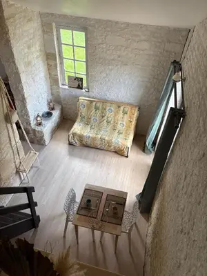 Coin salon dans l'établissement Au clos des hirondelles