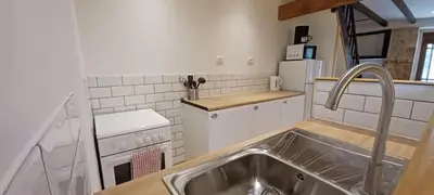 Cuisine ou kitchenette dans l'établissement Le Quereau