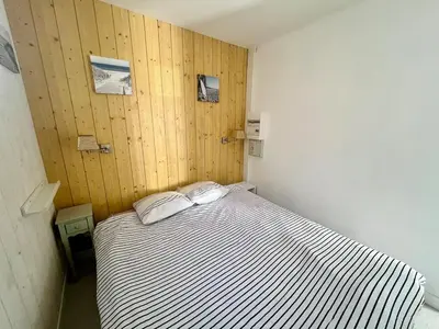 Un ou plusieurs lits dans un hébergement de l'établissement Cabane au Bord du Lac - Les Jardins de Vandré - Parc Jeux Tennis Spa Nature - IDEAL FAMILLE