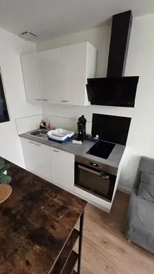 Cuisine ou kitchenette dans l'établissement Le Banksy hyper centre avec terrasse