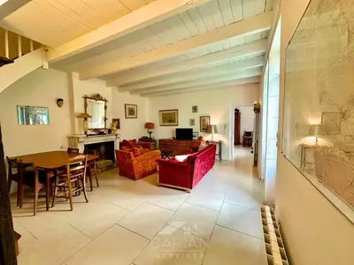 Coin salon dans l'établissement Charmante Maison Familiale - Grande Capacité