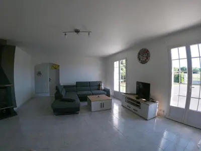 Coin salon dans l'établissement Maison avec grand jardin