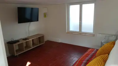 Télévision ou salle de divertissement dans l'établissement Home in Niort