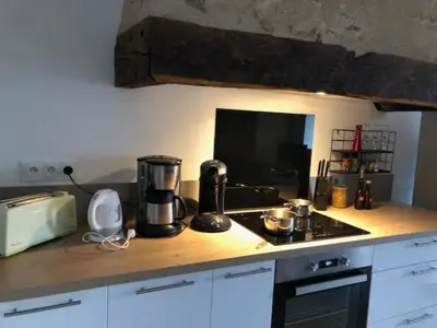 Cuisine ou kitchenette dans l'établissement campagne chaleureuse